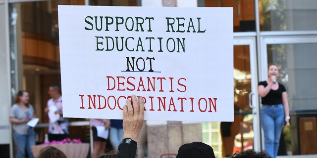 Protesters with signs