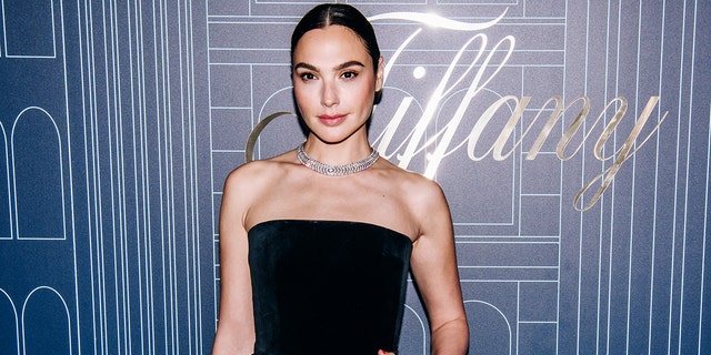 Gal Gadot in a strapless black gown and jewels at a Tiffany & Co. event