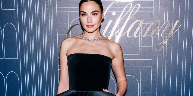 Gal Gadot in a strapless black gown and jewels at a Tiffany & Co. event