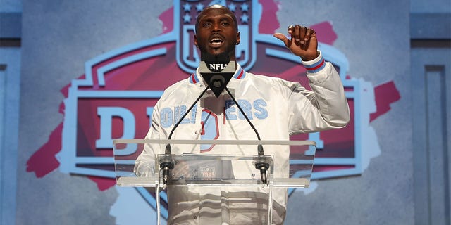 Jason McCourty announces a pick at the 2023 NFL Draft
