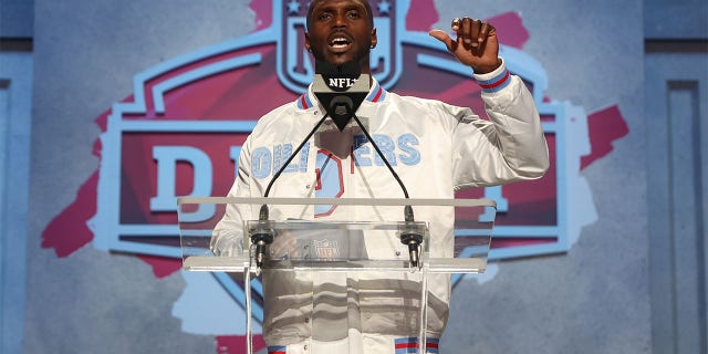 Jason McCourty announces a pick at the 2023 NFL Draft