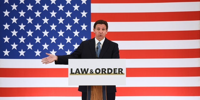 DeSantis stands at Law and Order podium