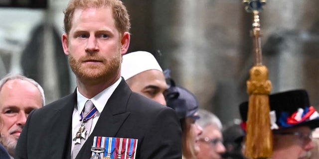 Prince Harry looking on at Westminster Abbey