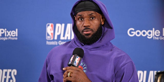 LeBron James talks to the media