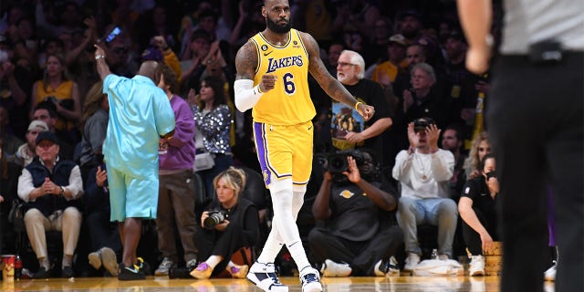 LeBron James celebrates against the Warriors