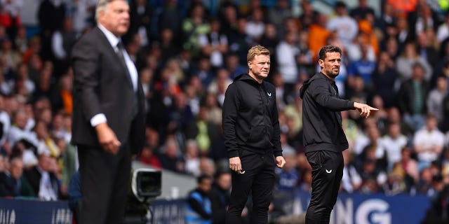 Eddie Howe stands on the sidelines during a Premier League match