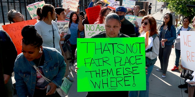 Another suburban New York community declares emergency as Adams to bus migrants from NYC to Long Island 2 NYC protesters against migrant housing in schools
