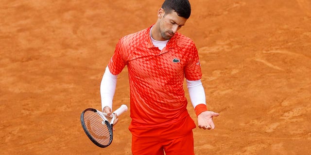 Novak Djokovic reacts to his game during the quarterfinal match at the Italian Open