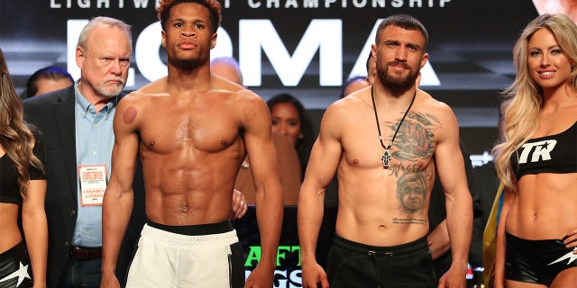 Devin Haney and Vasilly Lomachenko at their weigh-in on Friday