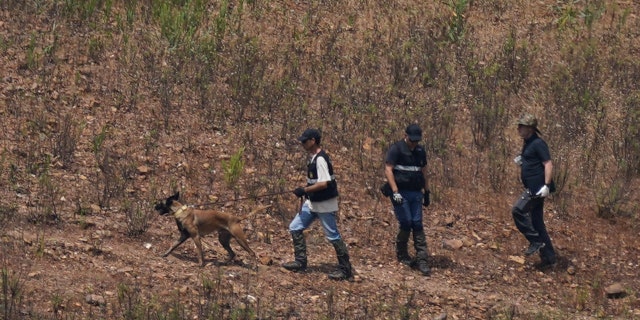 Authorities search for evidence with K9s in the Algave, Portugal.