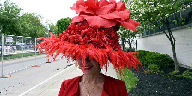 Large red Kentucky Derby hat