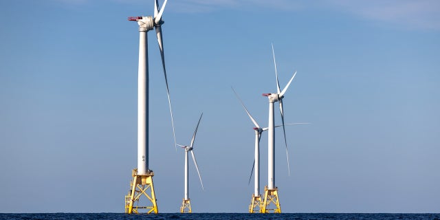 AT SEA - JULY 07: Wind turbines generate electricity at the Block Island Wind Farm on July 07, 2022 near Block Island, Rhode Island. The first commercial offshore wind farm in the United States is located 3.8 miles from Block Island, Rhode Island in the Atlantic Ocean. The five-turbine, 30 MW project was developed by Deepwater Wind and began operations in December, 2016 at a cost of nearly $300 million. (Photo by John Moore/Getty Images)