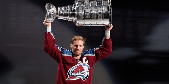 Gabriel Landeskog skates with the Stanley Cup