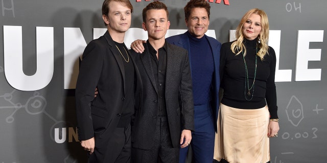 Rob Lowe stands next to his two sons, Matthew and John Owen and wife, Sheryl on the red carpet premiere of his show "Unstable," which also stars his son John Owen