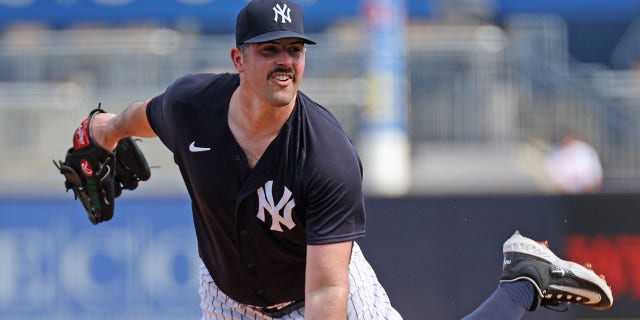 Yankees Carlos Rodon pitches during spring training
