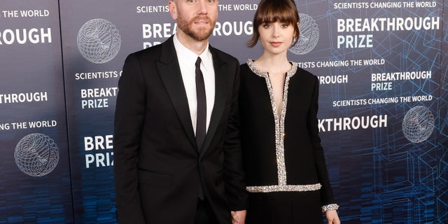 Lily Collins and husband Charlie McDowell at an event