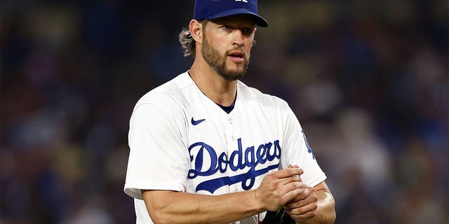 Clayton Kershaw pitches against the Cardinals