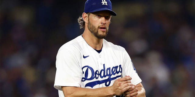 Clayton Kershaw pitches against the Cardinals