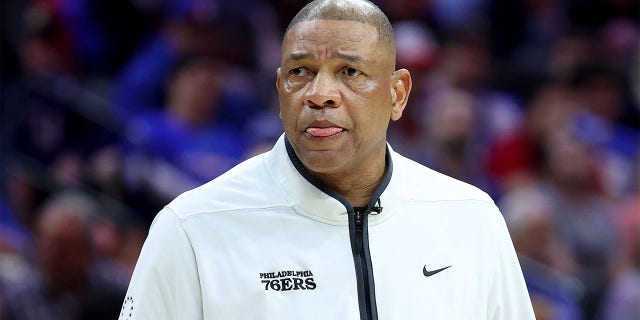 Doc Rivers coaches against the Boston Celtics