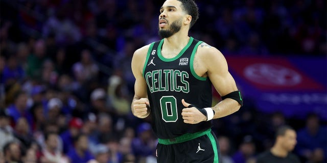 Jayson Tatum reacts against the 76ers