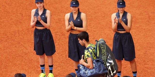 Carlos Alcaraz walks on court for the men's final at the Madrid Open