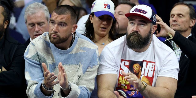 Travis Kelce and Jason Kelce at a Sixers game