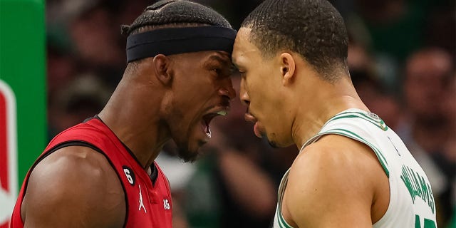 Jimmy Butler and Grant Williams exchange words