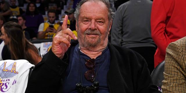 Jack Nicholson holding up finger at Lakers Game