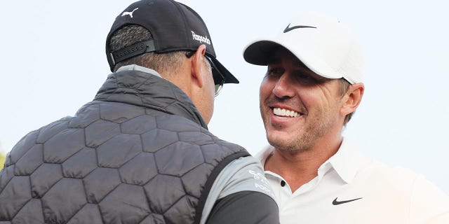 Brooks Koepka’s coach tears into media over LIV Golf narrative following PGA Championship 2 Brooks Koepka and coach Claude Harmon III embrace after winning the 2023 PGA Championship