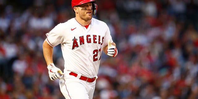 Mike Trout plays against the Red Sox