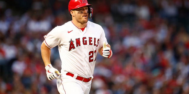 Mike Trout plays against the Red Sox