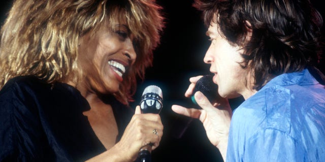 Tina Turner and Mick Jagger in 1985