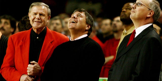 Denny Crum watches a film honoring the head coach