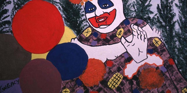 A photo of John Wayne Gacy's painted self-portrait in clown costume