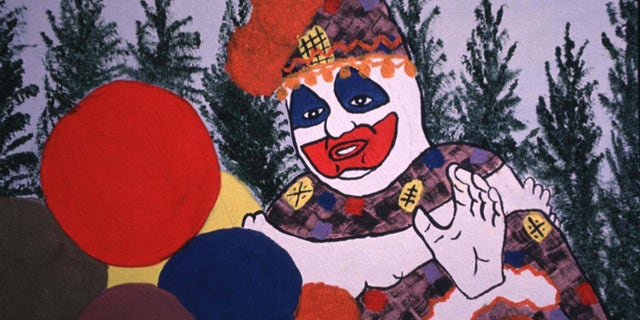 A photo of John Wayne Gacy's painted self-portrait in clown costume