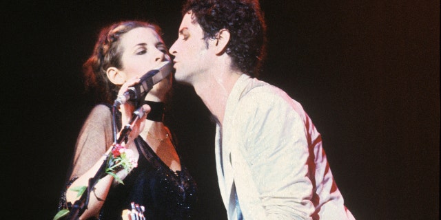 Stevie Nicks and Lindsey Buckingham on stage