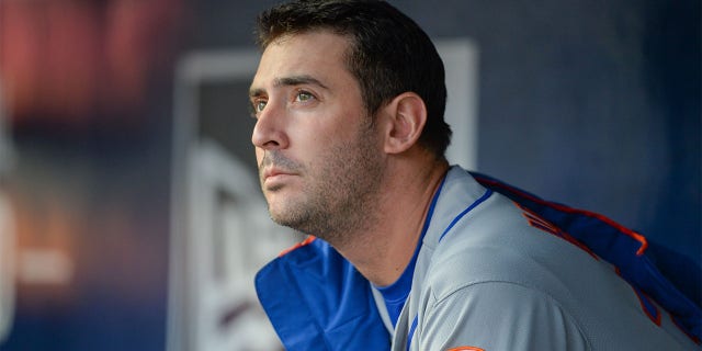 Matt Harvey sits in the Mets dugout