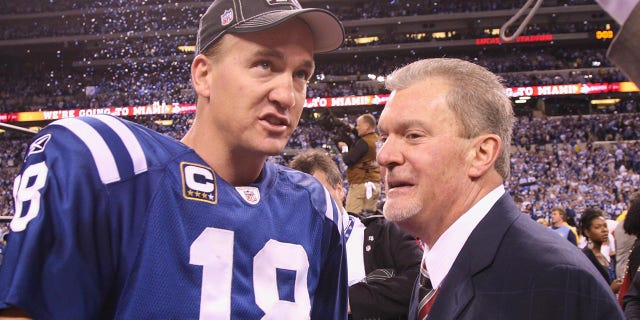 Peyton Manning with Colts owner Jim Irsay after winning the AFC Championship in 2010