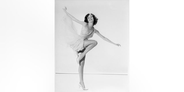 Mary Tyler Moore holding a dancers pose