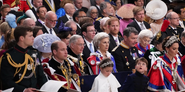 The british royal family sitting together at Westminster Abbey