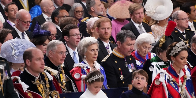 Prince Harry looking in the direction of his older brother Prince William during King Charles coronation