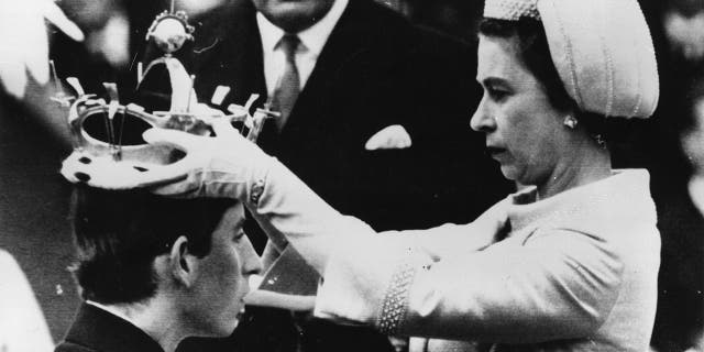 Prince Charles being crowned with coronet by his mother Queen Elizabeth