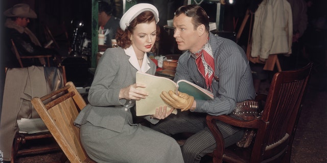 Roy Rogers reading to Dale Evans