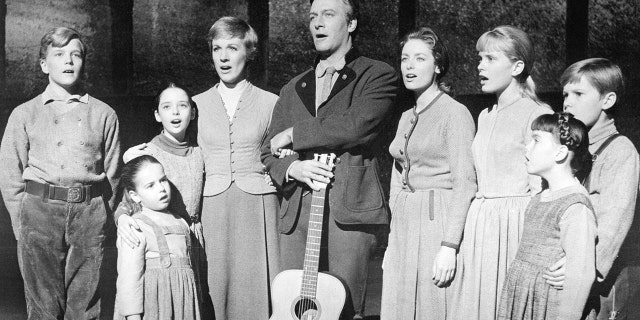 The actors playing members of the Von Trapp family in a promotional portrait for The Sound Of Music,