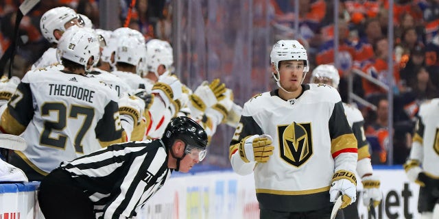 Zach Whitecloud celebrates a goal