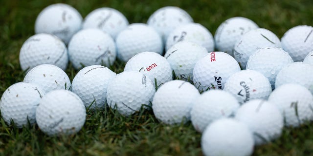 Golf balls on grass