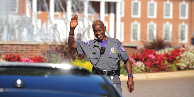 Ms. Val waving