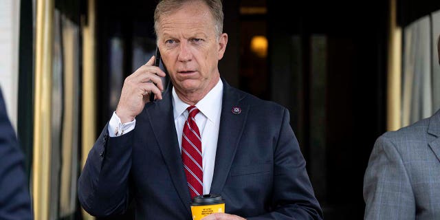 Rep. Kevin Hern (R-OK) leaves a caucus meeting with House Republicans on Capitol Hill