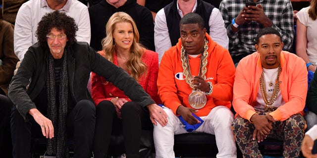 Howard Stern sits courtside by Tracy Morgan