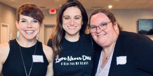 three women standing